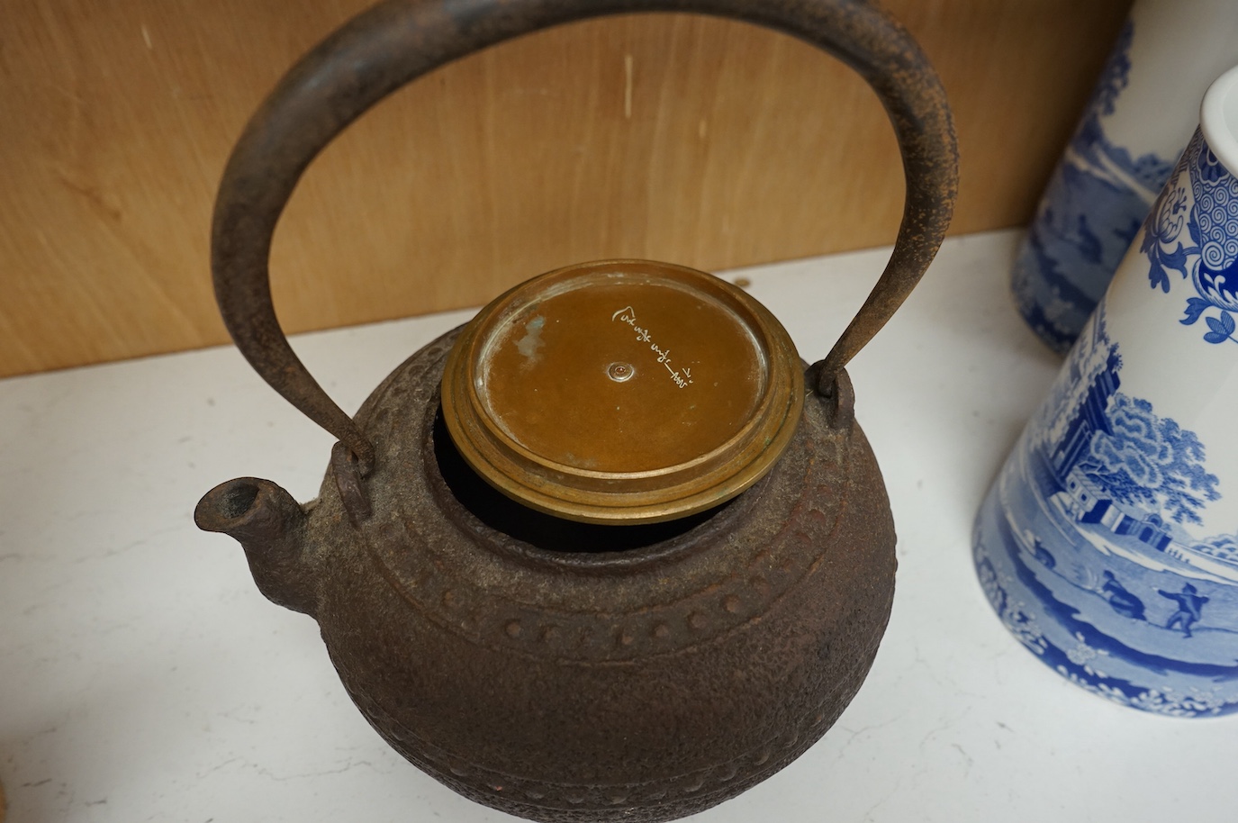A Japanese cast-iron teapot, 22.5cm high